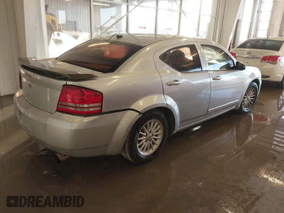 2009 Dodge Avenger SE with VIN 1B3LC46B09N571994, listed as a IAAI auction lot 41399307 with 172,223 mi miles and . Bid and sale history available at DreamBid. Image 4.