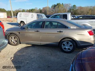 2015 Ford Sedan Police Interceptor with VIN 1FAHP2MK3FG135694, listed as a IAAI auction lot 41886352 with 128,478 mi miles. Bid and sale history available at carsss.com. Image 14.