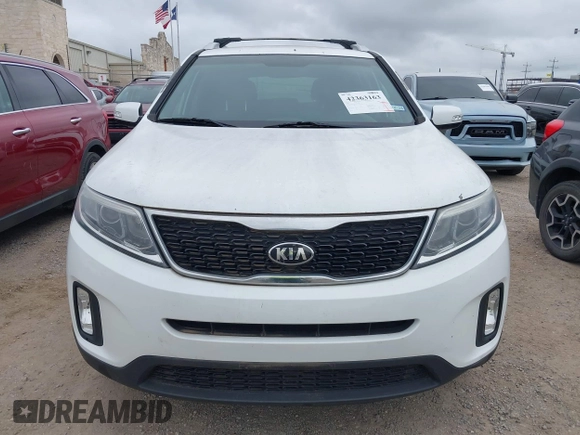 2014 Kia Sorento LX z VIN 5XYKT3A62EG533070, wystawiony jako IAAI lot #42363163 z przebiegiem 121 368 mil mil oraz . Historia ofert i sprzedaży dostępna na DreamBid. Obrazek 6.