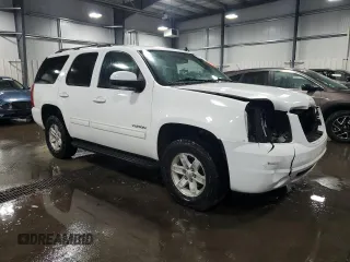 2014 GMC Yukon SLT with VIN 1GKS2CE01ER123696, listed as a Copart auction lot 63401554 with 177,174 mi miles and Salvage Title. Bid and sale history available at carsss.com. Image 4.