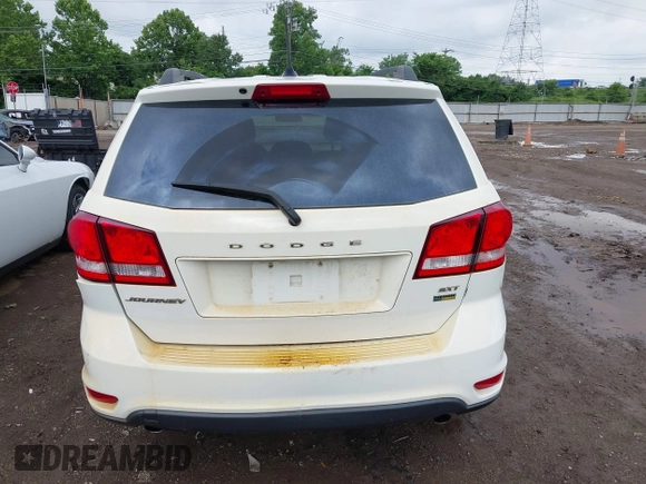 2017 Dodge Journey SXT z VIN 3C4PDCBG4HT531635, wystawiony jako IAAI lot #42460200 z przebiegiem 152 293 mil mil oraz . Historia ofert i sprzedaży dostępna na DreamBid. Obrazek 16.