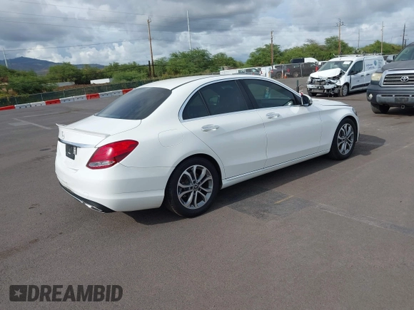 2018 Mercedes-Benz C 300 with VIN 55SWF4JB2JU258957, listed as a IAAI auction lot 42058233 with 61,788 mi miles and . Bid and sale history available at DreamBid. Image 4.