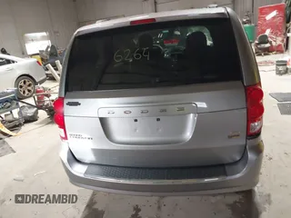 2014 Dodge Grand Caravan SXT z VIN 2C4RDGCGXER263963, wystawiony jako IAAI lot #41956264 z przebiegiem 138 815 mil mil oraz . Historia ofert i sprzedaży dostępna na DreamBid. Obrazek 16.