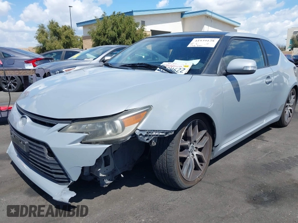 2014 Scion tC with VIN JTKJF5C71E3077886, listed as a IAAI auction lot 41939128 with 138,845 mi miles. Bid and sale history available at carsss.com. Image 19.