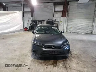 2023 Honda Civic Sedan EX with VIN 2HGFE1F71PH313006, listed as a Copart auction lot 48667815 with 32,942 mi miles and Salvage Title. Bid and sale history available at carsss.com. Image 10.