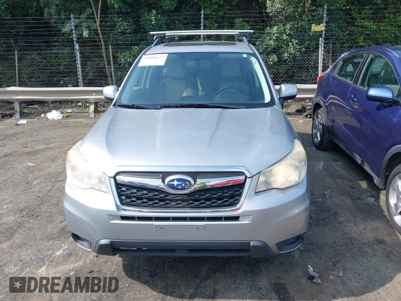 2014 Subaru Forester Premium with VIN JF2SJAGC0EH473208, listed as a IAAI auction lot 42800673 with 186,698 mi miles and . Bid and sale history available at DreamBid. Image 12.