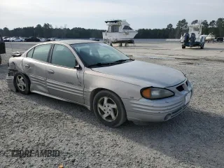 2000 Pontiac Grand Am SE1 with VIN 1G2NF52E7YM865163, listed as a Copart auction lot 48980595 with 198,303 mi miles and Salvage Title. Bid and sale history available at carsss.com. Image 4.