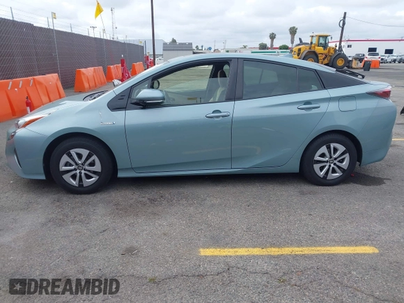 2016 Toyota Prius Four z VIN JTDKARFU8G3018145, wystawiony jako IAAI lot #42195308 z przebiegiem 87 649 mil mil oraz . Historia ofert i sprzedaży dostępna na DreamBid. Obrazek 14.