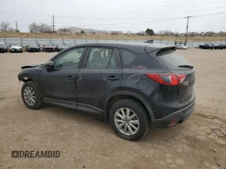 2016 Mazda CX-5 Sport with VIN JM3KE4BYXG0898807, listed as a Copart auction lot 48887985 with 71,418 mi miles and Salvage Title. Bid and sale history available at carsss.com. Image 2.