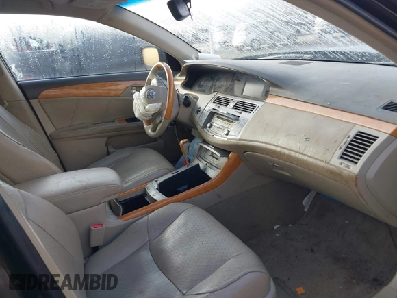 2007 Toyota Avalon XL z VIN 4T1BK36B87U178296, wystawiony jako IAAI lot #42187704 z przebiegiem 241 758 mil mil oraz . Historia ofert i sprzedaży dostępna na DreamBid. Obrazek 5.