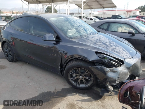 2025 Tesla Model Y Long Range with VIN 7SAYGDED6SF229498, listed as a IAAI auction lot 41086718 with 509 mi miles and . Bid and sale history available at DreamBid. Image 1.