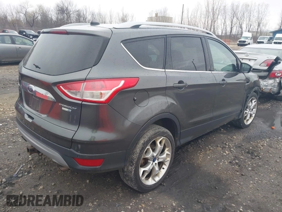 2015 Ford Escape Titanium with VIN 1FMCU9J94FUB49236, listed as a IAAI auction lot 42117378 with 112,267 mi miles. Bid and sale history available at carsss.com. Image 4.
