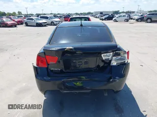 2010 Kia Forte EX with VIN KNAFU4A20A5847351, listed as a IAAI auction lot 41897921 with 129,084 mi miles. Bid and sale history available at carsss.com. Image 16.