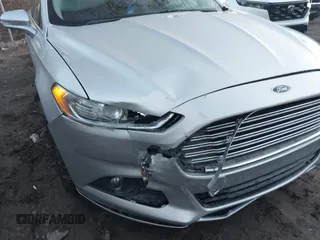 2013 Ford Fusion SE z VIN 3FA6P0H96DR268474, wystawiony jako IAAI lot #41757472 z przebiegiem 159 529 mil mil oraz . Historia ofert i sprzedaży dostępna na DreamBid. Obrazek 6.