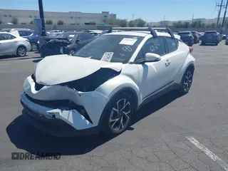 2019 Toyota C-HR XLE with VIN JTNKHMBX4K1040772, listed as a IAAI auction lot 41812031 with 79,729 mi miles. Bid and sale history available at carsss.com. Image 2.