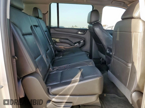 2016 Chevrolet Suburban LT z VIN 1GNSKHKC5GR217078, wystawiony jako Copart lot #61842825 z przebiegiem 221 198 mil mil oraz Czysty tytuł • Clean title. Historia ofert i sprzedaży dostępna na DreamBid. Obrazek 11.