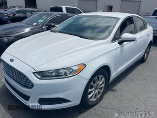2016 Ford Fusion S z VIN 3FA6P0G73GR359934, wystawiony jako IAAI lot #42785519 z przebiegiem 107 401 mil mil oraz . Historia ofert i sprzedaży dostępna na DreamBid. Obrazek 1.