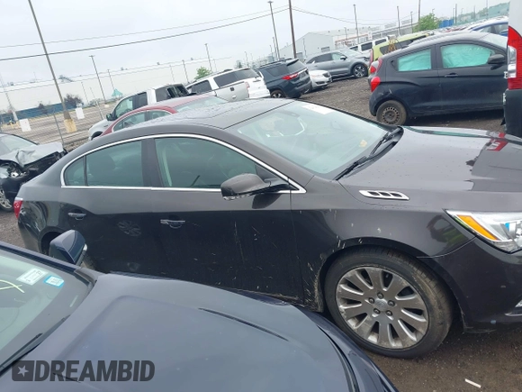 2014 Buick LaCrosse Leather with VIN 1G4GC5G31EF162299, listed as a IAAI auction lot 42432020 with 60,858 mi miles and . Bid and sale history available at DreamBid. Image 13.
