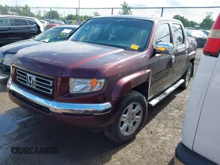 2007 Honda Ridgeline RTL with VIN 2HJYK16587H518901, listed as a IAAI auction lot 42762425 with 206,243 mi miles and . Bid and sale history available at DreamBid. Image 2.