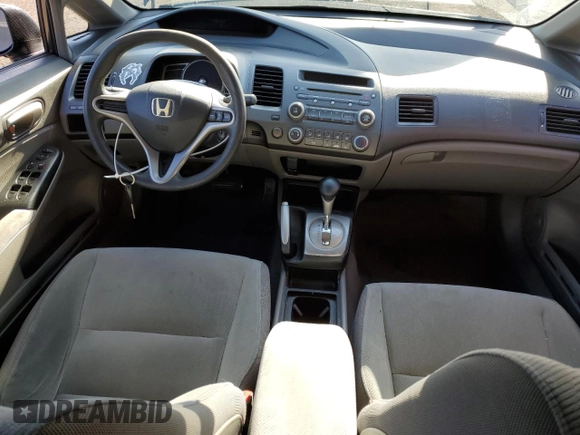 2009 Honda Civic LX z VIN 2HGFA16519H519732, wystawiony jako Copart lot #54018665 z przebiegiem 136 589 mil mil oraz Szkoda całkowita • Salvage title. Historia ofert i sprzedaży dostępna na DreamBid. Obrazek 8.