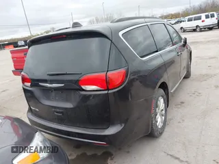 2017 Chrysler Pacifica Touring L with VIN 2C4RC1BG1HR797200, listed as a IAAI auction lot 42044020 with 124,115 mi miles and . Bid and sale history available at DreamBid. Image 16.