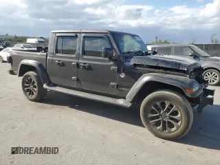 2021 Jeep Gladiator Overland with VIN 1C6HJTFG2ML517477, listed as a Copart auction lot 50061065 with 27,443 mi miles and Salvage title. Bid and sale history available at DreamBid. Image 4.