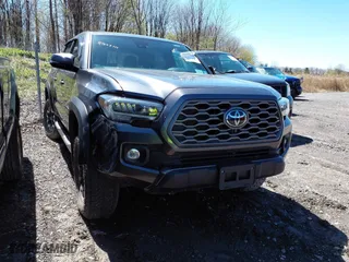 2023 Toyota Tacoma 4WD SR with VIN 3TMCZ5AN4PM625017, listed as a IAAI auction lot 41207111 with 38,582 mi miles. Bid and sale history available at carsss.com. Image 1.
