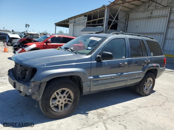2004 Jeep Grand Cherokee Laredo with VIN 1J4GX48N54C371073, listed as a Copart auction lot 52202855 with 212,368 mi miles and Salvage Title. Bid and sale history available at carsss.com. Image 1.
