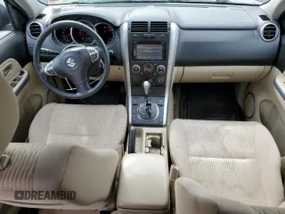 2013 Suzuki Grand Vitara Premium z VIN JS3TD0D65D4100272, wystawiony jako Copart lot #65140134 z przebiegiem 108 261 mil mil oraz Szkoda całkowita • Salvage title. Historia ofert i sprzedaży dostępna na DreamBid. Obrazek 8.