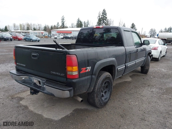 2000 Chevrolet Silverado 1500 LS with VIN 2GCEK19TXY1268976, listed as a IAAI auction lot 41909832 with 182,557 mi miles. Bid and sale history available at carsss.com. Image 4.