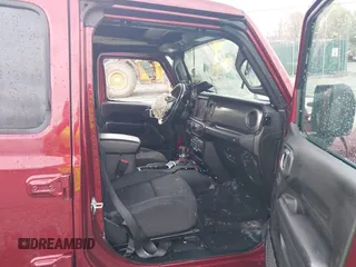 2021 Jeep Wrangler Unlimited Willys with VIN 1C4HJXDN8MW714976, listed as a IAAI auction lot 42080856 with 74,613 mi miles and . Bid and sale history available at DreamBid. Image 5.