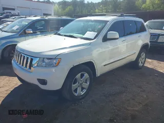 2012 Jeep Grand Cherokee Laredo with VIN 1C4RJEAG5CC106203, listed as a IAAI auction lot 41821138 with 157,474 mi miles. Bid and sale history available at carsss.com. Image 17.