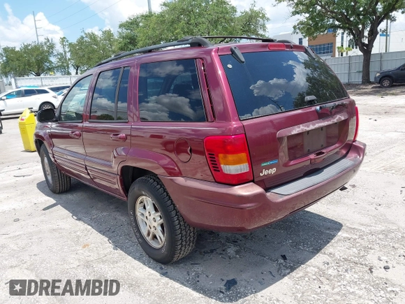 2000 Jeep Grand Cherokee Laredo with VIN 1J4G258S4YC381030, listed as a IAAI auction lot 42541918 with 306,934 mi miles and . Bid and sale history available at DreamBid. Image 3.