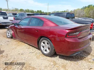 2019 Dodge Charger SXT with VIN 2C3CDXBG1KH698786, listed as a IAAI auction lot 41922507 with 108,666 mi miles. Bid and sale history available at carsss.com. Image 3.