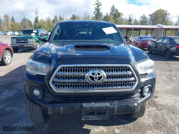 2016 Toyota Tacoma SR5 with VIN 5TFDZ5BN7GX001869, listed as a IAAI auction lot 40610002 with 184,380 mi miles. Bid and sale history available at carsss.com. Image 12.