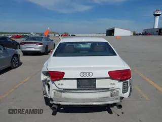 2011 Audi A8 z VIN WAUAVAFD7BN021601, wystawiony jako IAAI lot #42233726 z przebiegiem 182 583 mil mil oraz . Historia ofert i sprzedaży dostępna na DreamBid. Obrazek 6.
