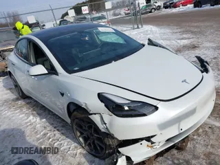2022 Tesla Model 3 Long Range with VIN 5YJ3E1EB6NF114723, listed as a IAAI auction lot 41396258 with 2,179 mi miles. Bid and sale history available at carsss.com. Image 1.