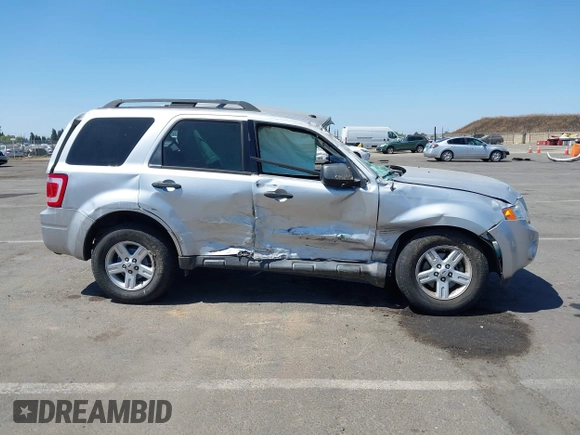 2011 Ford Escape Hybrid with VIN 1FMCU4K33BKB53300, listed as a IAAI auction lot 42561682 with 144,628 mi miles and . Bid and sale history available at DreamBid. Image 13.