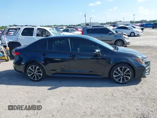 2021 Toyota Corolla SE with VIN JTDS4MCE5MJ056494, listed as a IAAI auction lot 41936866 with 128,257 mi miles. Bid and sale history available at carsss.com. Image 13.