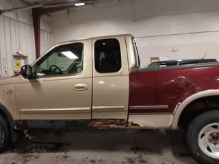 1999 Ford F-150 z VIN 2FTRX18W9XCA83920, wystawiony jako IAAI lot #41875700 z przebiegiem 234 325 mil mil oraz . Historia ofert i sprzedaży dostępna na DreamBid. Obrazek 15.