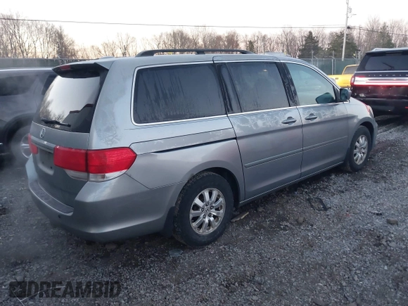2009 Honda Odyssey EX-L with VIN 5FNRL387X9B005030, listed as a IAAI auction lot 41775144 with 155,531 mi miles. Bid and sale history available at carsss.com. Image 4.