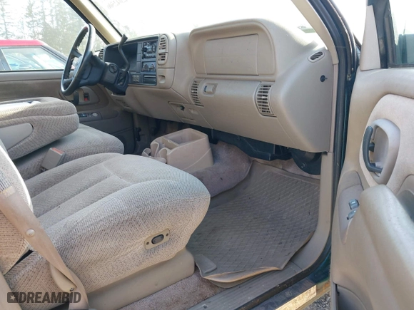 1998 Chevrolet Tahoe with VIN 1GNEK13R9WJ365044, listed as a IAAI auction lot 42042506 with 187,987 mi miles. Bid and sale history available at carsss.com. Image 5.