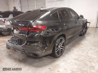 2021 BMW X6 xDrive40i with VIN 5UXCY6C03M9E61703, listed as a IAAI auction lot 41602401 with 1 mi miles. Bid and sale history available at carsss.com. Image 4.