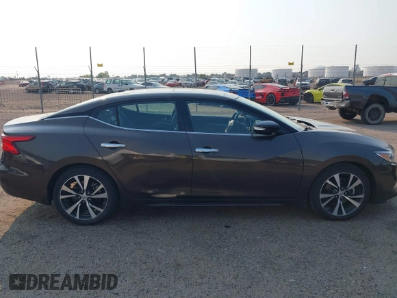2016 Nissan Maxima SV with VIN 1N4AA6AP9GC384035, listed as a IAAI auction lot 42856838 with 116,736 mi miles and . Bid and sale history available at DreamBid. Image 13.