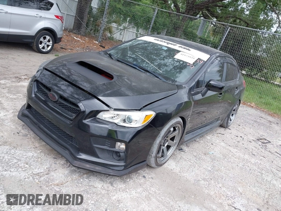 2016 Subaru WRX with VIN JF1VA1B65G9801044, listed as a IAAI auction lot 41973939 with 82,420 mi miles. Bid and sale history available at carsss.com. Image 2.