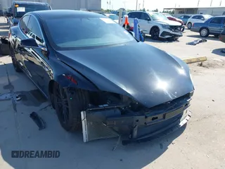 2021 Tesla Model S Long Range Plus with VIN 5YJSA1E28MF426080, listed as a IAAI auction lot 41979326 with 125,328 mi miles and . Bid and sale history available at DreamBid. Image 6.