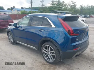2019 Cadillac XT4 AWD Premium Luxury with VIN 1GYFZDR48KF148405, listed as a IAAI auction lot 42475624 with 88,630 mi miles and . Bid and sale history available at DreamBid. Image 3.