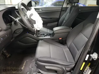 2018 Hyundai Tucson SE with VIN KM8J23A4XJU706089, listed as a Copart auction lot 48947104 with 61,074 mi miles and Salvage Title. Bid and sale history available at carsss.com. Image 7.