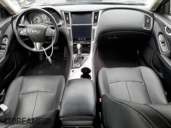 2015 Infiniti Q50 Premium z VIN JN1BV7AP0FM349503, wystawiony jako Copart lot #57766245 z przebiegiem 101 237 mil mil oraz Szkoda całkowita • Salvage title. Historia ofert i sprzedaży dostępna na DreamBid. Obrazek 8.