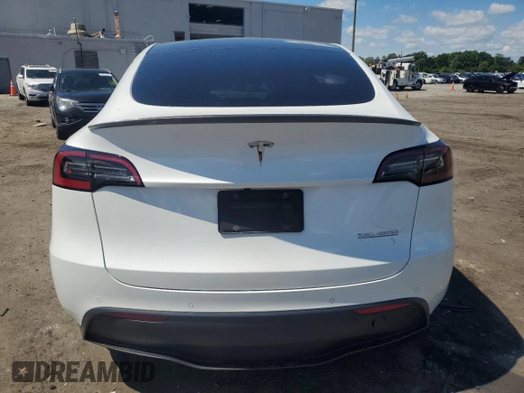 2022 Tesla Model Y Performance with VIN 7SAYGDEF9NF372337, listed as a Copart auction lot 55889345 with 51,099 mi miles and Salvage title. Bid and sale history available at DreamBid. Image 6.
